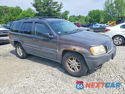 Czwarte zdjęcie samochodu z boku: 2004 JEEP GRAND CHEROKEE LAREDO VIN:1J4GW48S24C371430 - miniatura