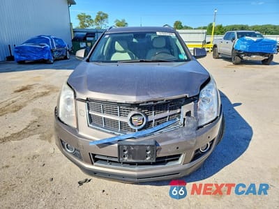 Piąte zdjęcie samochodu w środku: 2011 CADILLAC SRX PREMIUM COLLECTION VIN:3GYFNFEY7BS631461 - miniatura