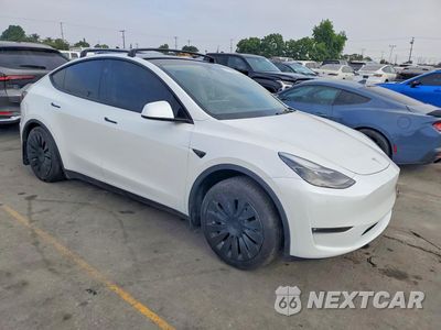 Czwarte zdjęcie samochodu z boku: 2023 TESLA MODEL Y VIN:7SAYGAEE1PF881184 - miniatura
