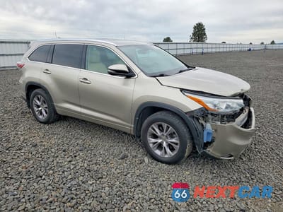 Czwarte zdjęcie samochodu z boku: 2015 TOYOTA HIGHLANDER XLE VIN:5TDJKRFH0FS083130 - miniatura
