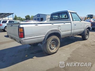 Trzecie zdjęcie samochodu z tyłu: 1984 DATSUN 720 LONG BED 4X4 VIN:1N6ND02Y7EC371575 - miniatura