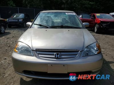 Piąte zdjęcie samochodu w środku: 2002 HONDA CIVIC LX VIN:1HGES16692L005069 - miniatura