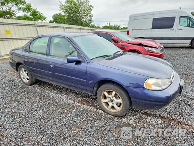 Czwarte zdjęcie samochodu z boku: 1999 FORD CONTOUR SE VIN:1FAFP6631XK225414 - miniatura