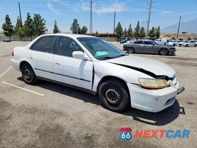 Czwarte zdjęcie samochodu z boku: 1999 HONDA ACCORD LX VIN:1HGCG5548XA152373 - miniatura
