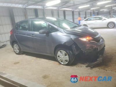 Czwarte zdjęcie samochodu z boku: 2020 HONDA FIT LX VIN:3HGGK5H45LM726159 - miniatura