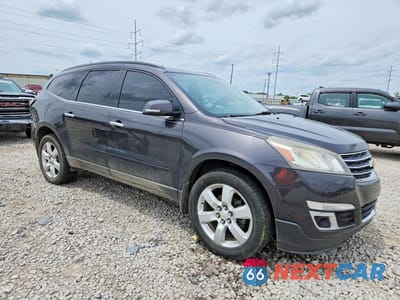 Czwarte zdjęcie samochodu z boku: 2016 CHEVROLET TRAVERSE LT VIN:1GNKRGKD9GJ107633 - miniatura