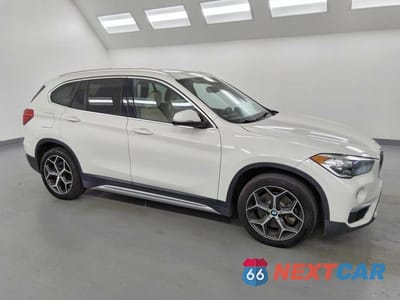 Czwarte zdjęcie samochodu z boku: 2018 BMW X1 XDRIVE28I VIN:WBXHT3C31J5L24535 - miniatura