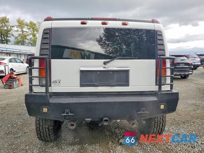 Zdjęcie 6 z 13 samochodu: 2004 HUMMER H2 VIN:5GRGN23U74H100340 - miniatura