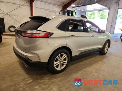 Trzecie zdjęcie samochodu z tyłu: 2019 FORD EDGE SEL VIN:2FMPK4J96KBB39916 - miniatura