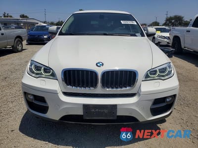 Piąte zdjęcie samochodu w środku: 2014 BMW X6 XDRIVE35I VIN:5UXFG2C53E0H10057 - miniatura