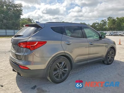 Trzecie zdjęcie samochodu z tyłu: 2014 HYUNDAI SANTA FE SPORT 2.0T VIN:5XYZW3LA9EG149679 - miniatura