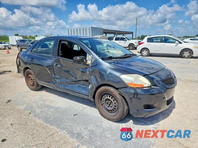 Czwarte zdjęcie samochodu z boku: 2011 TOYOTA YARIS BASE VIN:JTDBT4K34BL002107 - miniatura