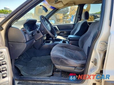 Zdjęcie 7 z 13 samochodu: 2000 JEEP GRAND CHEROKEE LAREDO VIN:1J4GW48S4YC341870 - miniatura