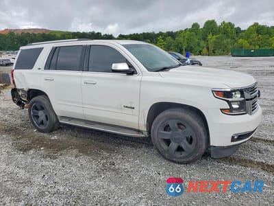 Czwarte zdjęcie samochodu z boku: 2015 CHEVROLET TAHOE C1500 LTZ VIN:1GNSCCKCXFR104970 - miniatura