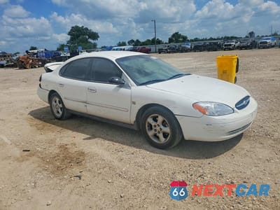 Czwarte zdjęcie samochodu z boku: 2002 FORD TAURUS SES VIN:1FAFP55SX2A110652 - miniatura