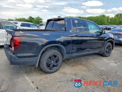 Trzecie zdjęcie samochodu z tyłu: 2021 HONDA RIDGELINE BLACK EDITION VIN:5FPYK3F83MB012458 - miniatura