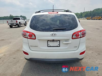 Zdjęcie 6 z 13 samochodu: 2012 HYUNDAI SANTA FE GLS VIN:5XYZGDAB8CG116975 - miniatura