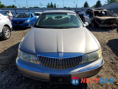 Piąte zdjęcie samochodu w środku: 2002 LINCOLN CONTINENTAL VIN:1LNHM97V62Y699843 - miniatura