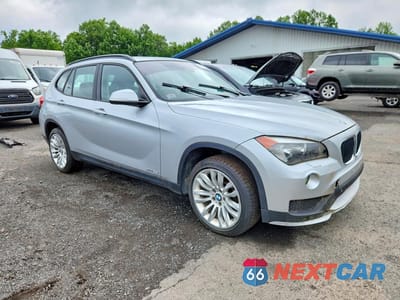 Czwarte zdjęcie samochodu z boku: 2015 BMW X1 XDRIVE28I VIN:WBAVL1C58FVY32527 - miniatura