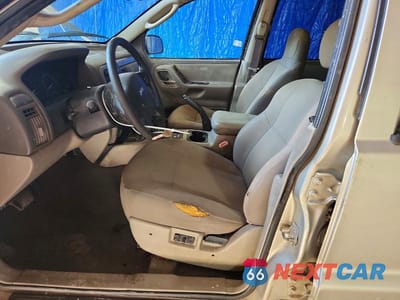 Zdjęcie 7 z 13 samochodu: 2004 JEEP GRAND CHEROKEE LAREDO VIN:1J4GW48S34C238675 - miniatura