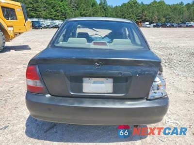 Zdjęcie 6 z 12 samochodu: 2003 MAZDA PROTEGE VIN:JM1BJ225030115941 - miniatura