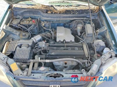 Zdjęcie 12 z 13 samochodu: 1999 HONDA CR-V LX VIN:JHLRD1844XC020000 - miniatura