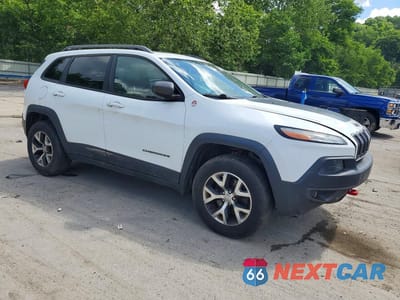 Czwarte zdjęcie samochodu z boku: 2014 JEEP CHEROKEE TRAILHAWK VIN:1C4PJMBSXEW153314 - miniatura