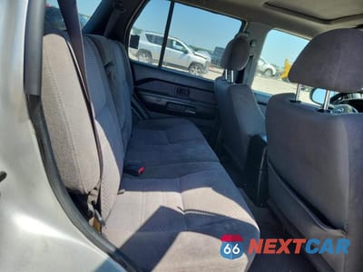 Zdjęcie 11 z 13 samochodu: 2003 NISSAN PATHFINDER SE VIN:JN8DR09Y33W836861 - miniatura