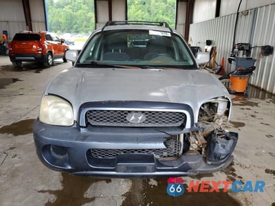 Piąte zdjęcie samochodu w środku: 2004 HYUNDAI SANTA FE GLS VIN:KM8SC73D54U814257 - miniatura
