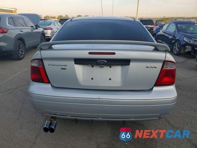 Zdjęcie 6 z 12 samochodu: 2005 FORD FOCUS ZX4 VIN:1FAFP34N05W220410 - miniatura