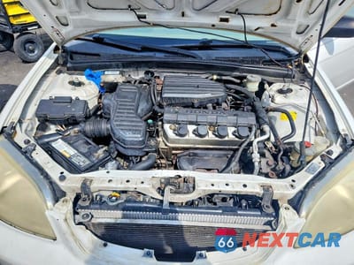 Zdjęcie 11 z 12 samochodu: 2001 HONDA CIVIC LX VIN:1HGEM22531L020551 - miniatura
