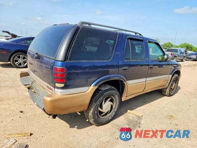 Trzecie zdjęcie samochodu z tyłu: 1999 GMC JIMMY VIN:1GKDT13W7X2524991 - miniatura