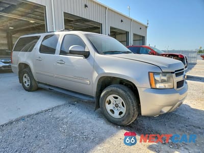 Czwarte zdjęcie samochodu z boku: 2007 CHEVROLET SUBURBAN K1500 VIN:3GNFK163X7G188969 - miniatura