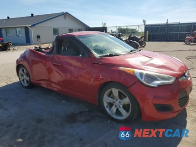 Czwarte zdjęcie samochodu z boku: 2012 HYUNDAI VELOSTER BASE VIN:KMHTC6AD2CU041747 - miniatura