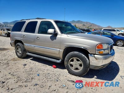 Czwarte zdjęcie samochodu z boku: 2002 GMC YUKON VIN:1GKEK13ZX2R213153 - miniatura