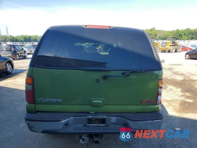Zdjęcie 6 z 13 samochodu: 2000 GMC YUKON VIN:1GKEK13T7YJ134364 - miniatura