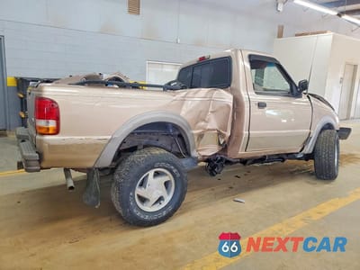 Trzecie zdjęcie samochodu z tyłu: 1993 FORD RANGER VIN:1FTCR11X8PUB14853 - miniatura