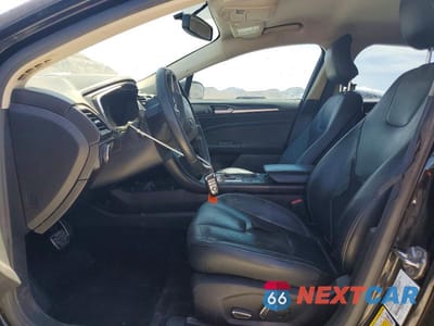 Zdjęcie 7 z 12 samochodu: 2017 FORD FUSION TITANIUM PHEV VIN:3FA6P0SU2HR209828 - miniatura