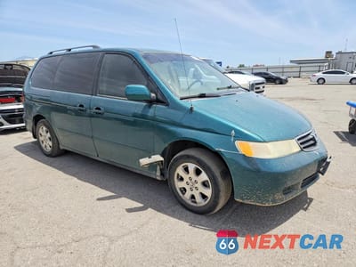 Czwarte zdjęcie samochodu z boku: 2002 HONDA ODYSSEY EX VIN:2HKRL18602H519343 - miniatura