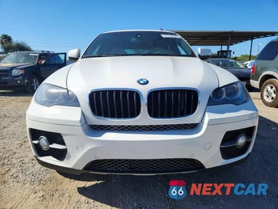 Piąte zdjęcie samochodu w środku: 2012 BMW X6 XDRIVE35I VIN:5UXFG2C54CLX09850 - miniatura