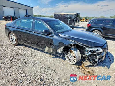Czwarte zdjęcie samochodu z boku: 2015 BMW 750 LXI VIN:WBAYF8C50FD654793 - miniatura