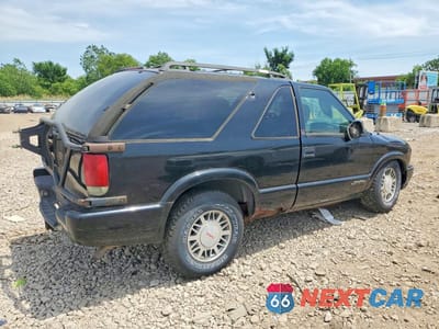 Trzecie zdjęcie samochodu z tyłu: 2001 GMC JIMMY VIN:1GKCT18W31K254864 - miniatura
