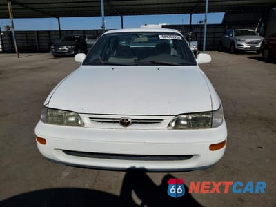 Piąte zdjęcie samochodu w środku: 1997 TOYOTA COROLLA DX VIN:1NXBB02E9VZ515263 - miniatura
