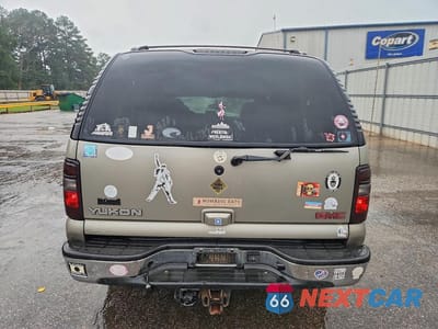Zdjęcie 6 z 14 samochodu: 2002 GMC YUKON VIN:1GKEC13Z12J235540 - miniatura