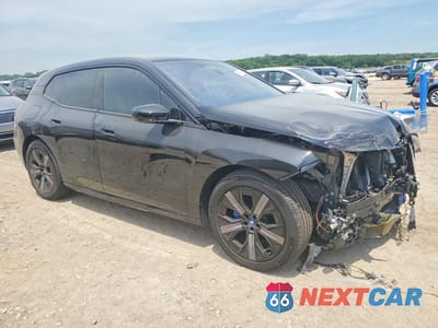 Czwarte zdjęcie samochodu z boku: 2023 BMW IX XDRIVE50 VIN:WB523CF02PCM84959 - miniatura
