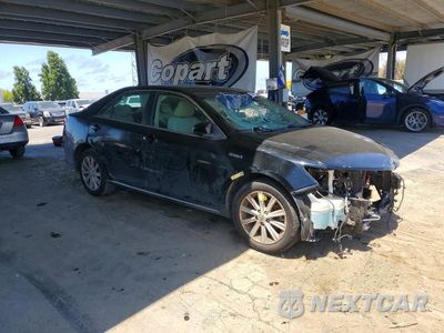 Czwarte zdjęcie samochodu z boku: 2013 TOYOTA CAMRY HYBRID XLE VIN:4T1BD1FK1DU091463 - miniatura