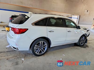 Trzecie zdjęcie samochodu z tyłu: 2019 ACURA MDX SPORT HYBRID ADVANCE VIN:5J8YD7H71KL001923 - miniatura