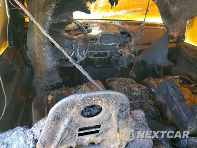 Zdjęcie 8 z 13 samochodu: 2003 FORD EXCURSION LIMITED VIN:1FMNU43S23EB44179 - miniatura