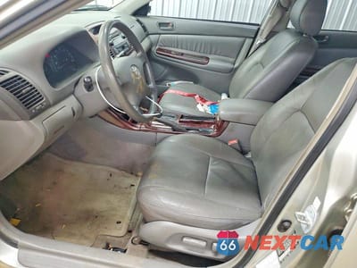 Zdjęcie 7 z 12 samochodu: 2003 TOYOTA CAMRY LE VIN:JTDBE32K330227956 - miniatura