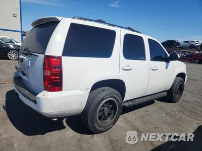Trzecie zdjęcie samochodu z tyłu: 2012 CHEVROLET TAHOE C1500 LT VIN:1GNSCBE08CR228145 - miniatura